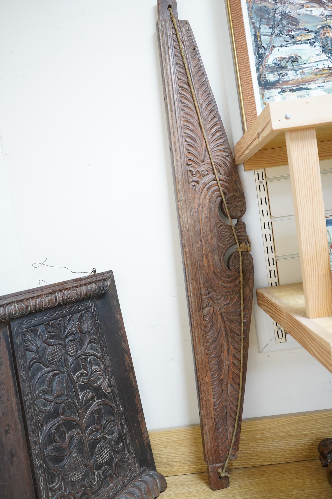An Anglo-Indian carved wood crest and a similar door portico, latter 127cm in length